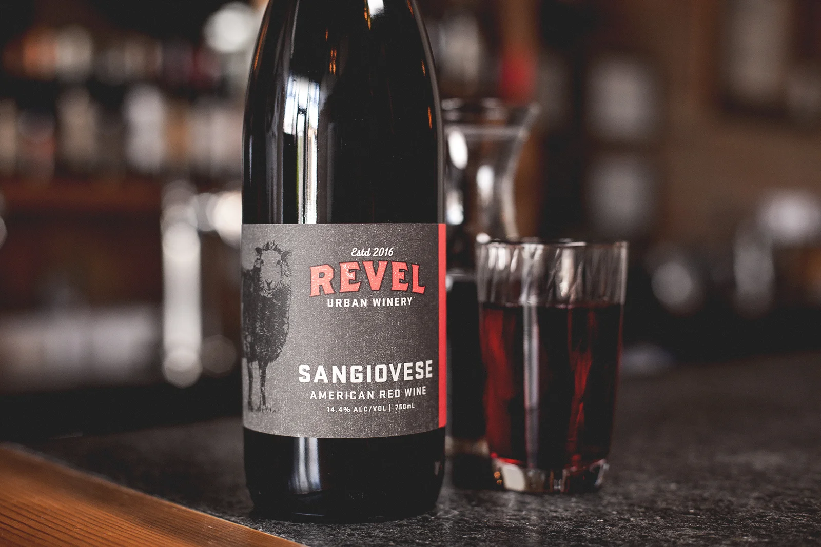 Revel Sangiovese bottle on the bar