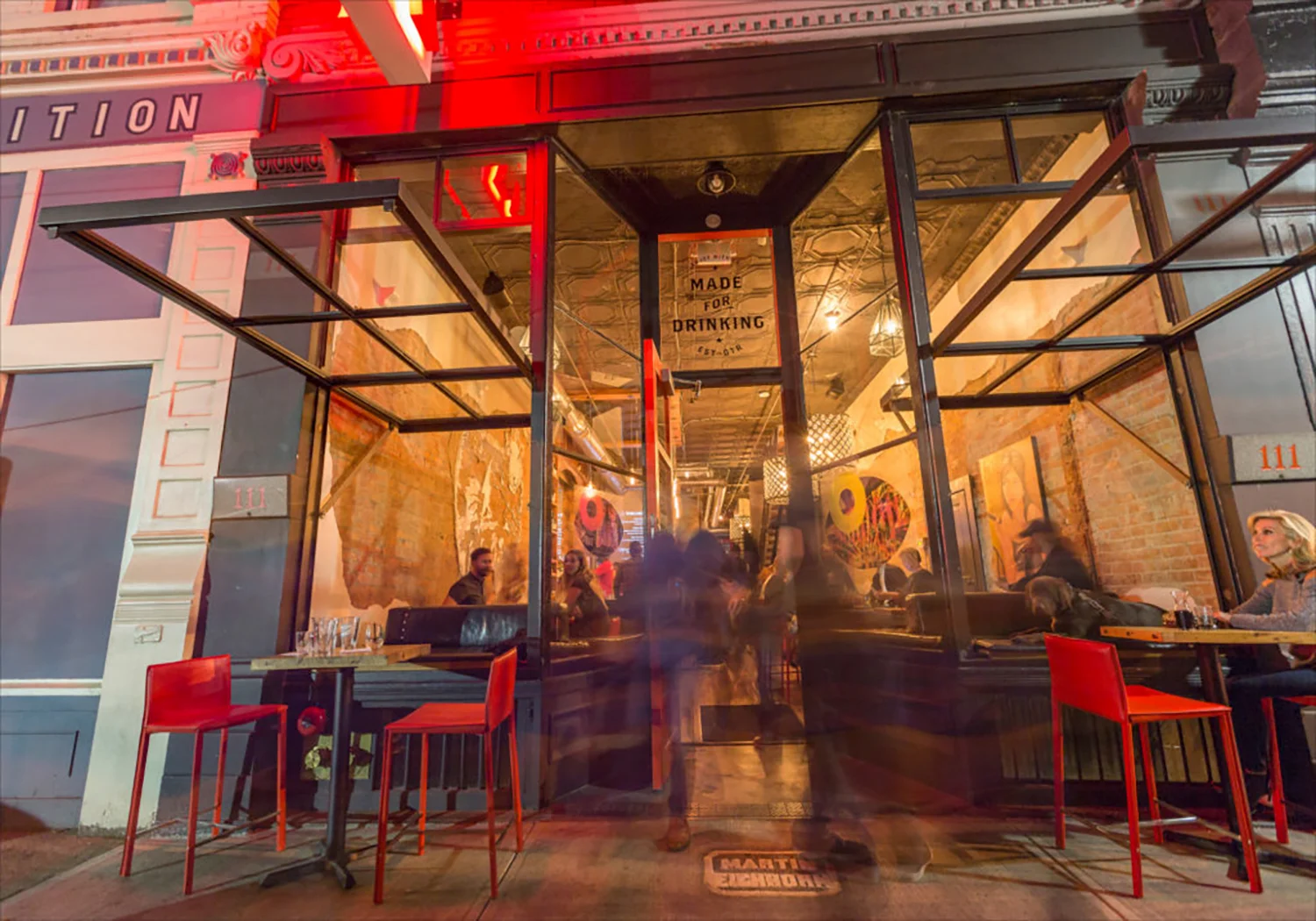 Revel OTR exterior at night — 111 E 12th Street